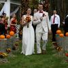 The lovely couple walking down the aisle as husband and wife.