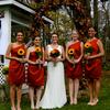 The bride with her bridesmaids in front of the gazebo.